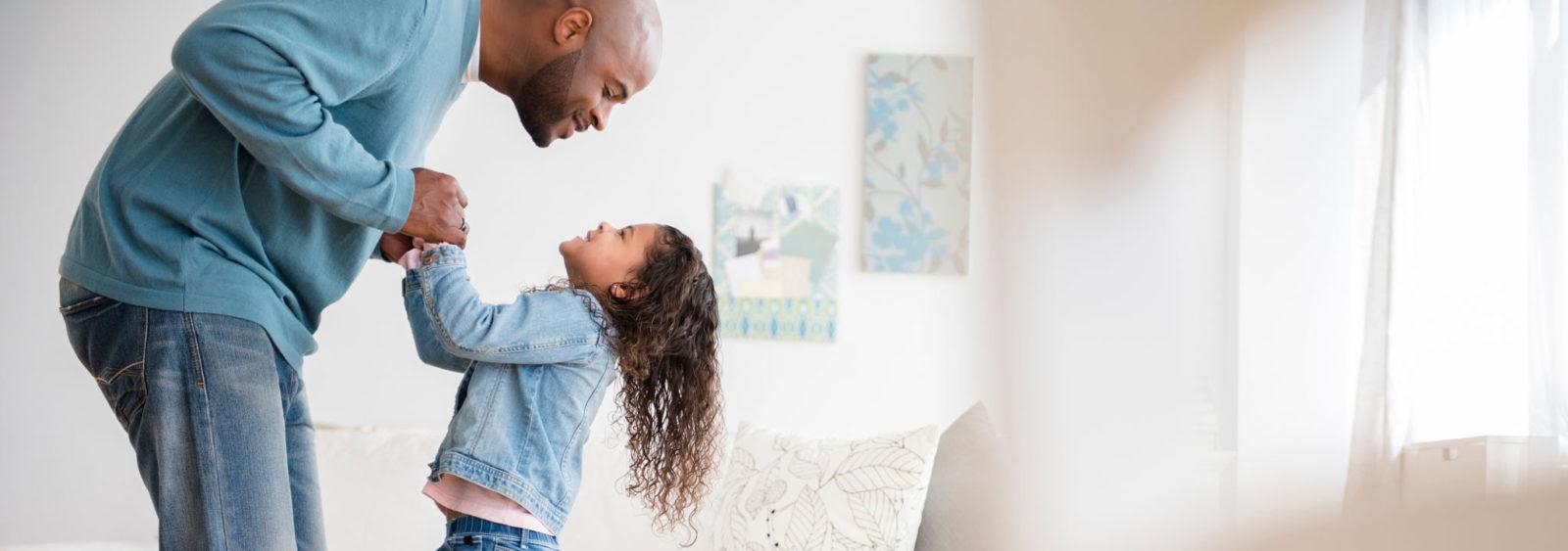 father having fun with his daughter